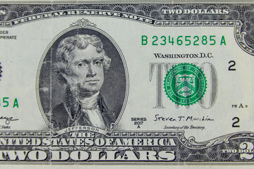 Macro shot of the two dollars bill