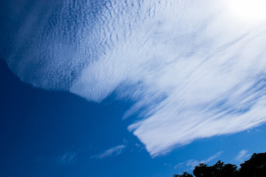Rare clouds in the blue sky.