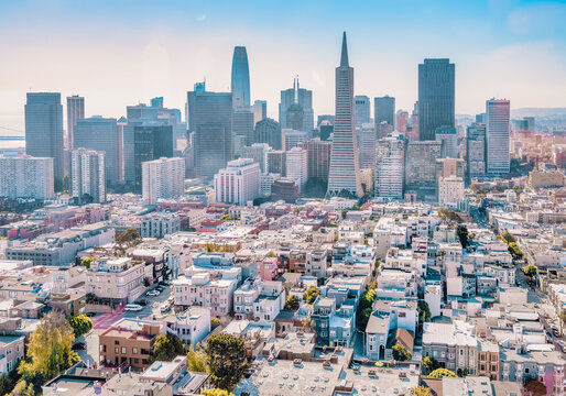 Beautiful aerial view from the Coit Tower to downtown San Francisco, magnificent skyscrapers of the famous American city. Photo edited in pastel colors.