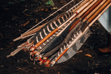 Hand made feathered indian arrows