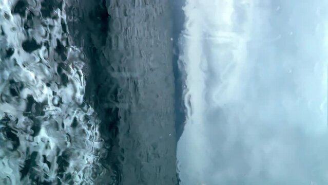 A ferry trip between Vestnes and Molde during a storm. Atlantic Ocean, west coast of Norway. Vertical video
