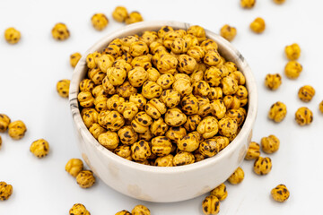 Roasted chickpeas on a white background. Close-up. local name leblebi