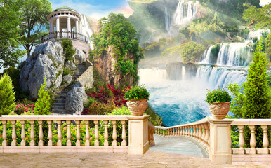 View of the fabulous waterfall from the terrace and gazebo. A waterfall high in the mountains. The...