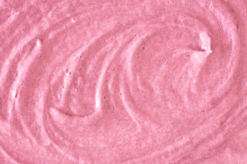 Pink cream texture. The surface of berry yogurt and a smoothie of whipped cream. Background texture...