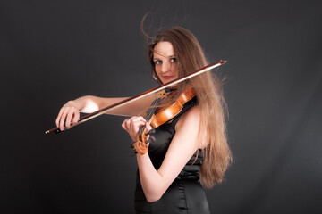 studio portrait of a violinist