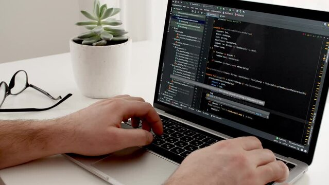 Coding on the screen, HTML encoding and programming on a laptop screen, developer, web development. Computer Web Developer. Cloud data social network media or virus. High quality 4k footage