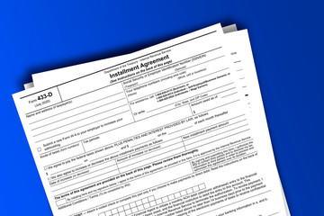 Form 433-D documentation published IRS USA 07.27.2020. American tax document on colored