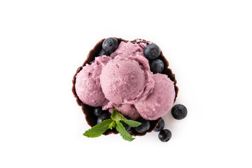 Blueberry ice cream scoop in waffle basket isolated on white background	