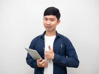 Asian man holding tablet and thumb up confident emotion
