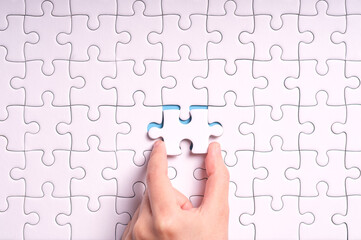 hand jigsaw puzzle pattern missing piece White jigsaw puzzle pattern top view to express alliance...