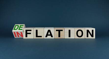Inflation or Deflation The cubes form the choice words Inflation or Deflation.
