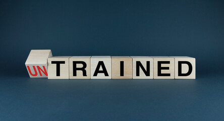 Untrained or Trained. Cubes form the choice words Untrained or Trained.