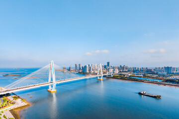 High view sunny day scenery of Century Bridge on Haidian River, Haikou, Hainan, China