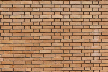 Orange brick masonry wall, bright orange brick background