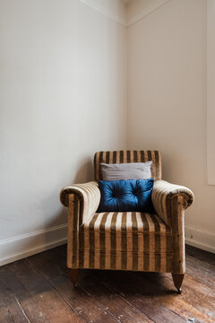 Striped Chair With Rich Velvet Cushion.