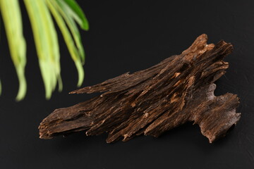 Close UpShot Of Sticks Of oudh On Black Background The Incense Chips Used By Burning It Or For...