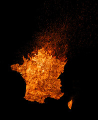France silhouette in fire on black background