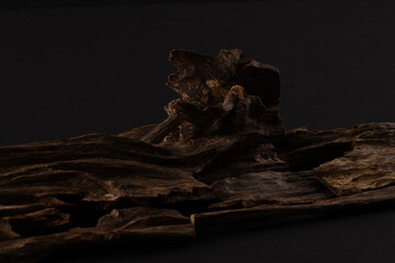 Close UpShot Of Sticks Of oudh On Black Background The Incense Chips Used By Burning It Or For...