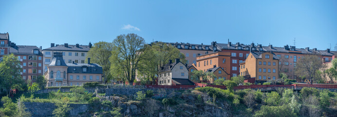 Panorma view of houses at the vista point board walk Montelius vägen in the district Södermalm a sunny day in Stockholm