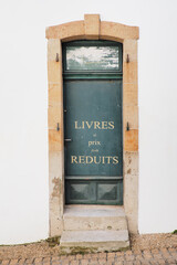 door of an old abandoned bookstore in the town of Audierne, in the Finistère department in the south of beautiful Brittany