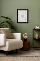 Stylish composition of living room interior with mock up, green wall, white armchair with brown pillow. Brown consola with accessories. Mock up poster. Template.