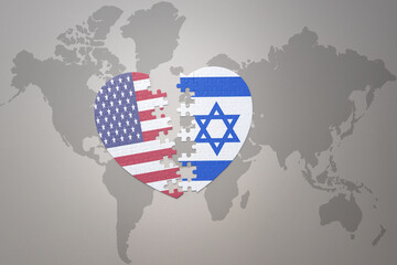 puzzle heart with the national flag of united states of america and israel on a world map background. Concept.