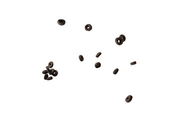 Chocolate rings cereal spill out into a bowl. Breakfast.