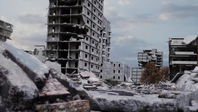 Huge damage cause by the war in Ukraine. The ruined city landmarks, debris of buildings, smoldering parts of Mariupol city structures. A convoy of tanks drive through the occupied city. The horror of
