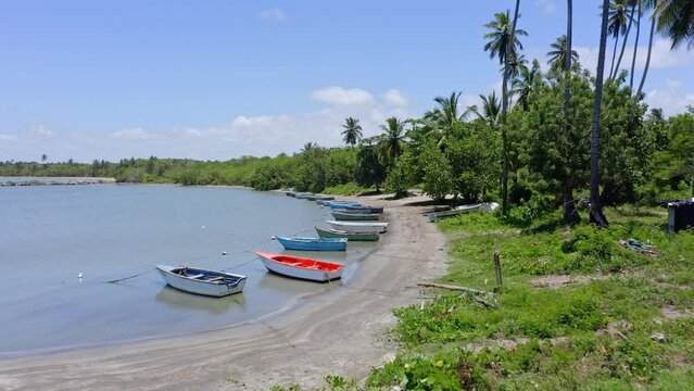 Fishing boats anchored at beach close to the Soco river mouth; aerial