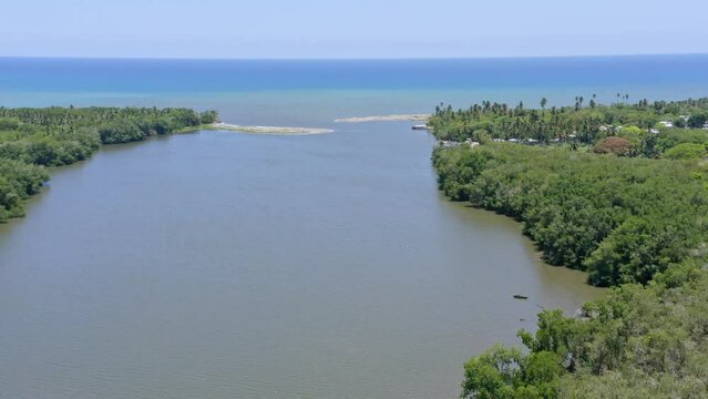 River mouth of the Soco river in San Pedro De Macoris; aerial push-in