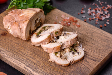 Delicious fresh meat roll made from chicken fillet, mushrooms, spices and herbs