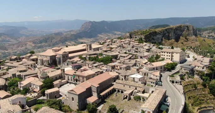 Gerace, Calabria, Italy. Aerial drone view. Slow turning flight around the city.