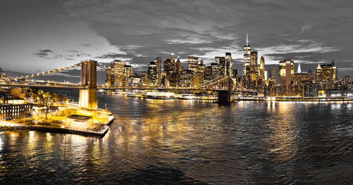 New York City golden lights on black and white background panoramic view