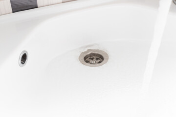 white sink in the bathroom. close-up