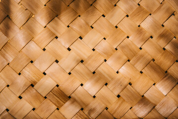 Woven bamboo straw texture background. Natural organic wicker pattern and palm shadow light for...