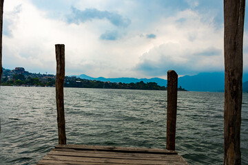 wooden bridge over lake Atitlan