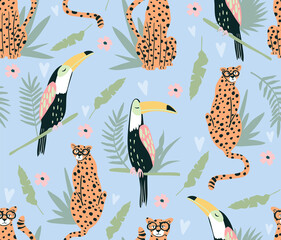 Cute tropical animals and birds seamless pattern. Background with toucans and cheetah. Perfect for creating fabrics, textiles, wrapping paper, packaging.