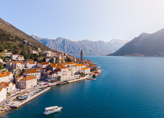 Fototapeta na wymiar Aerial Panoramic view of Perast historic old town in Kotor Bay during a sunny spring day, Montenegro