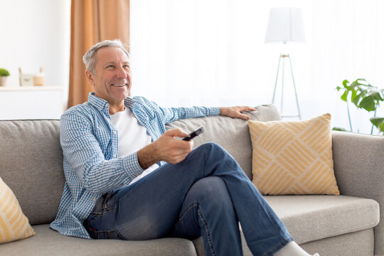 Mature Guy Spending Weekend Watching Tv At Home