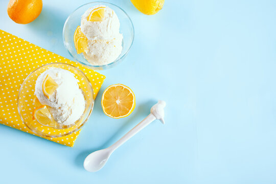Homemade fresh lemon ice cream with lemon slices. Summer delicious tasty dessert.