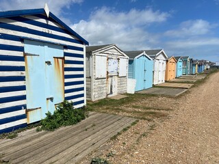 bulverhythe beach, West St. Leonards, East Sussex, UK -  beautiful shingle pebble beach with beach huts boats 