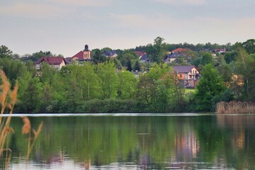 Fototapeta na wymiar reflections of trees in the lake