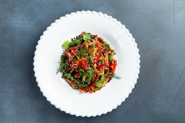 Salad with beef, pods and hot peppers. view from above.