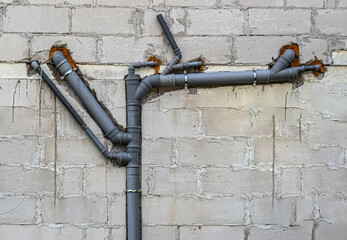 waste pipe on the wall - obrazy, fototapety, plakaty