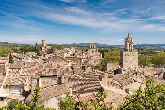 Cucuron, France - April 2022 : Clock tower of the village of Cucuron in the Luberon valley in Provence, France