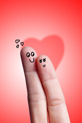 two fingers in love with red background