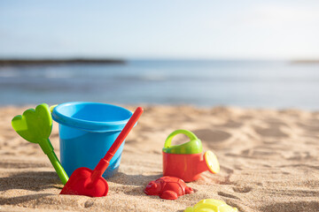 Beach toys in the sand on a sunny beach