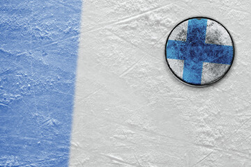 Hockey arena and puck with the image of the Finnish flag
