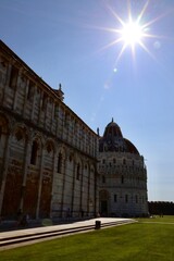 the palace of arts against the sun Pisa