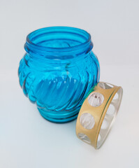 An unquenchable lamp made of blue glass. Candle for the grave with a lid. A memorial candle. A memory candle.